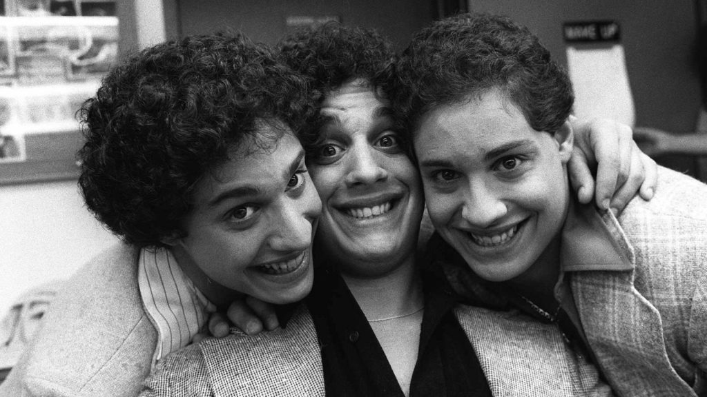 Three Identical Strangers